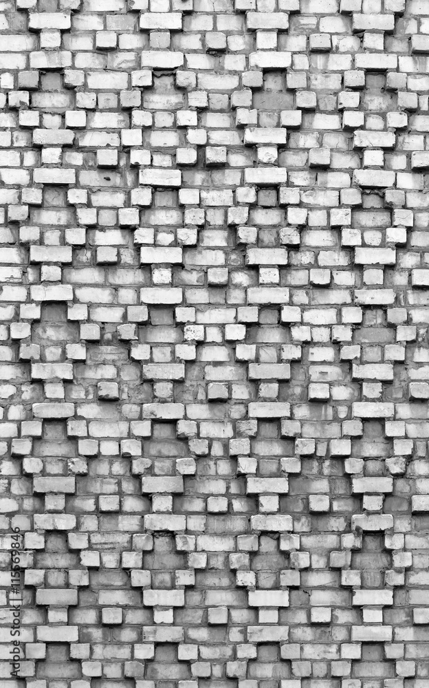 Brickwork pattern. Old black and white wall as background Brickwork pattern. Old black and white wall as background