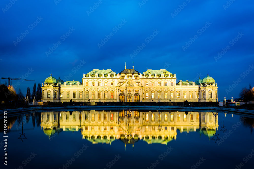 Belvedere Palace reflecting in a pool at night, in Vienna, Austr