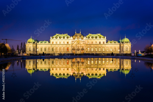Belvedere Palace reflecting in a pool at night, in Vienna, Austr