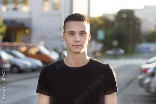 Young man in 20s serious expression portrait