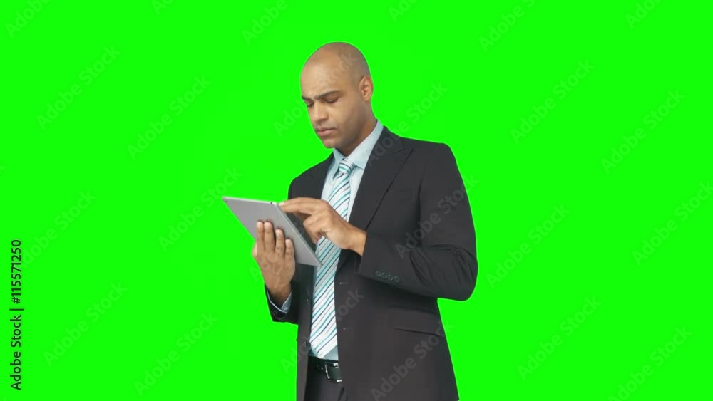 Businessman using his tablet pc Businessman using his tablet pc