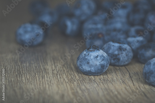 Blueberries on wood background 