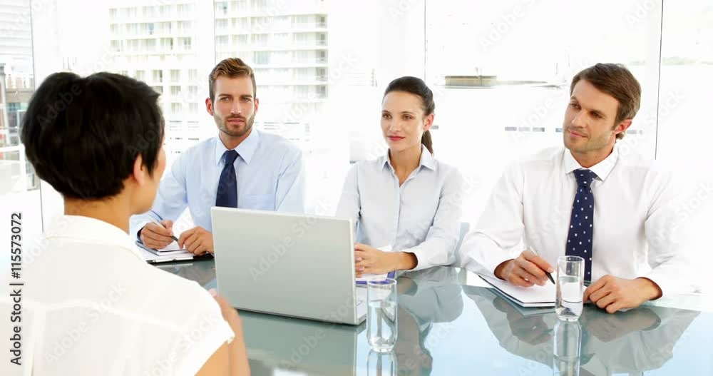 Interview panel speaking to applicant Interview panel speaking to applicant