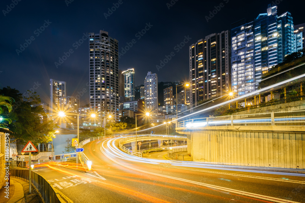 Long exposure of traffic on Upper Albert Road, and modern skyscr