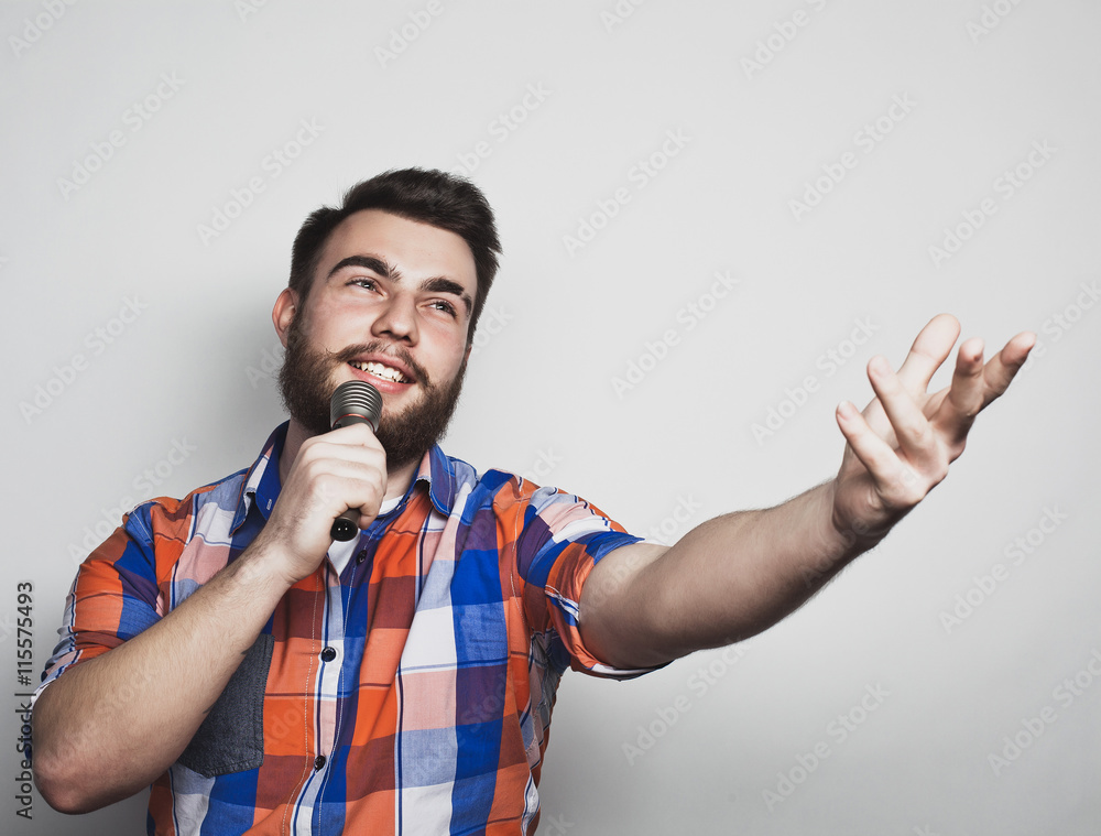 Fototapeta premium young singer with microphone