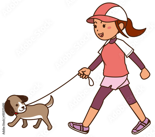 犬の散歩をしながらウォーキングをする女性