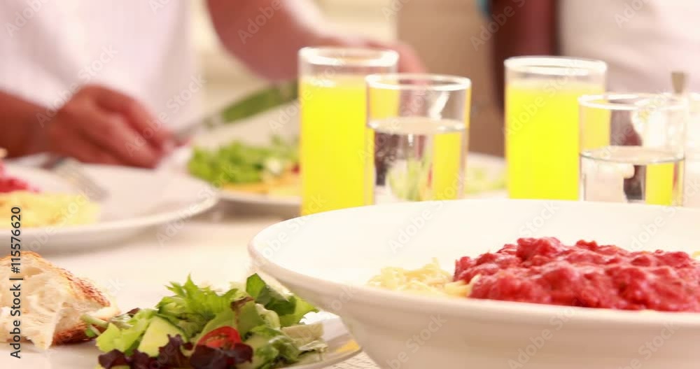 People are in table and eating People are in table and eating