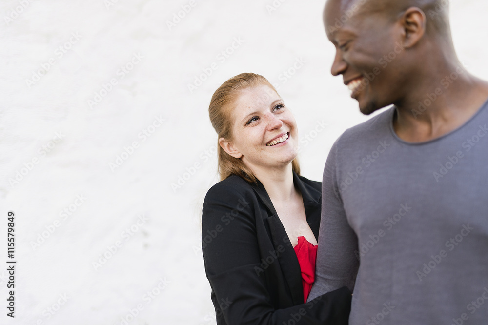 Sweden, Studio shot of mid adult couple laughing Sweden, Studio shot of mid adult couple laughing