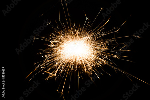 Sparkler on black background for Christmas or new year party, close-up