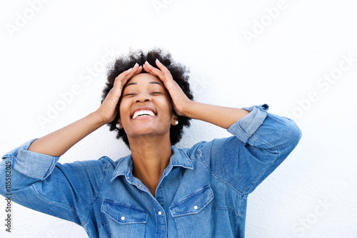 Close up portrait of young woman laughing photo