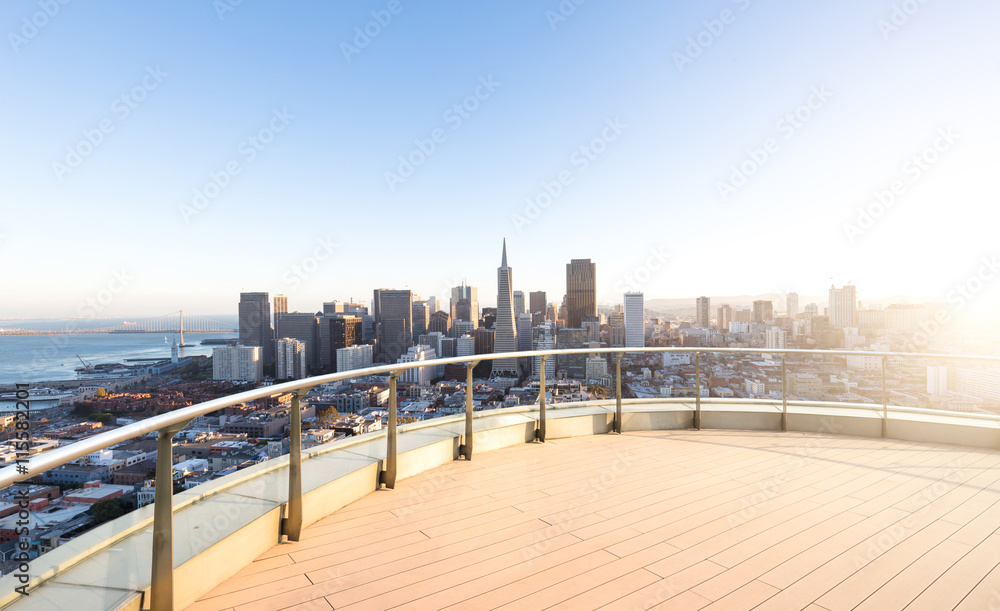 empty street with cityscape and skyline of san francisco at sunr