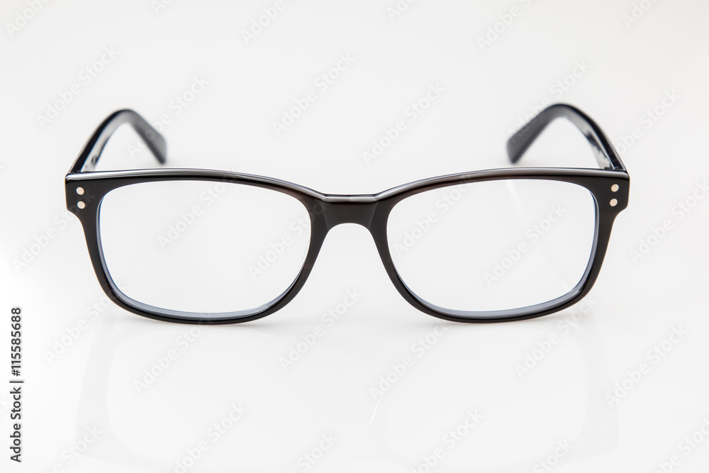 Retro style black eyeglasses on a white background. Retro style black eyeglasses on a white background.