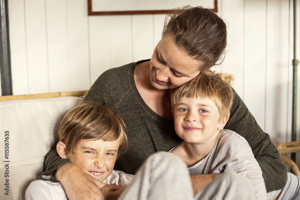 Sweden, Uppland, Runmaro, Barrskar, Portrait of mother with two sons (4-5, 6-7) Sweden, Uppland, Runmaro, Barrskar, Portrait of mother with two sons (4-5, 6-7)