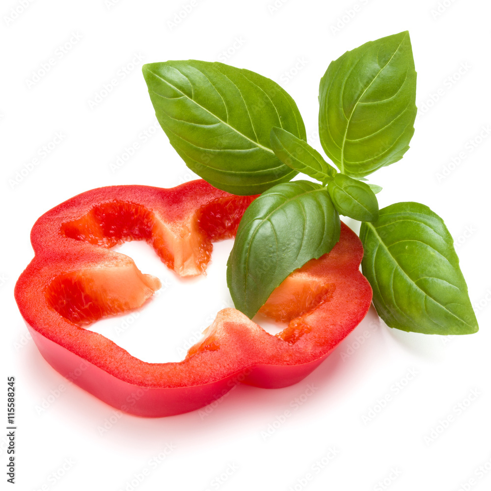 Red sweet bell pepper slice and basil leaves isolated on white b Red sweet bell pepper slice and basil leaves isolated on white b