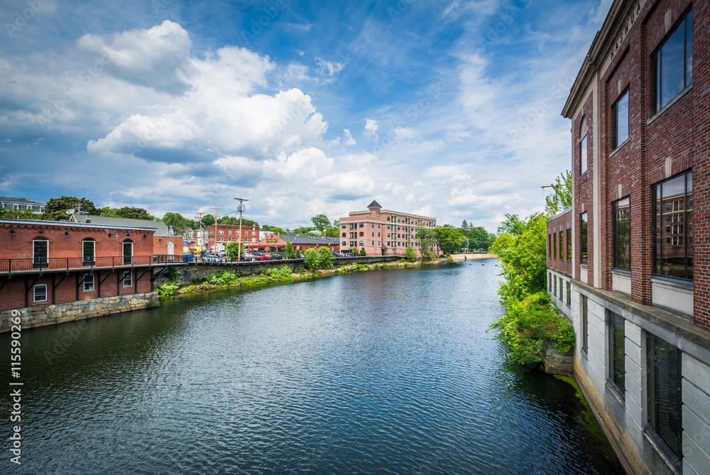 Fototapeta premium Buildings along the Nashua River, in Nashua, New Hampshire.