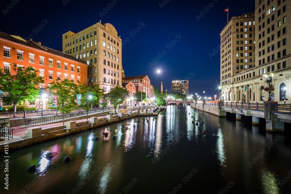 Buildings in downtown and the Providence River at night, in Prov