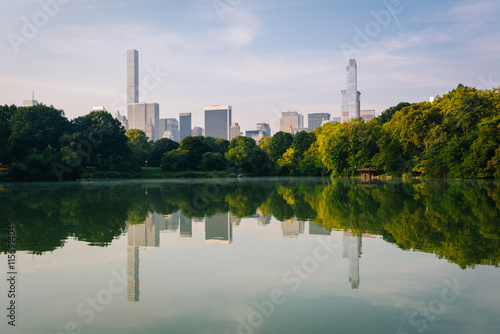 Buildings reflecting in The Lake  at Central Park  in Manhattan 