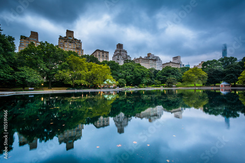 Buildings reflecting in the Conservatory Water in Central Park 