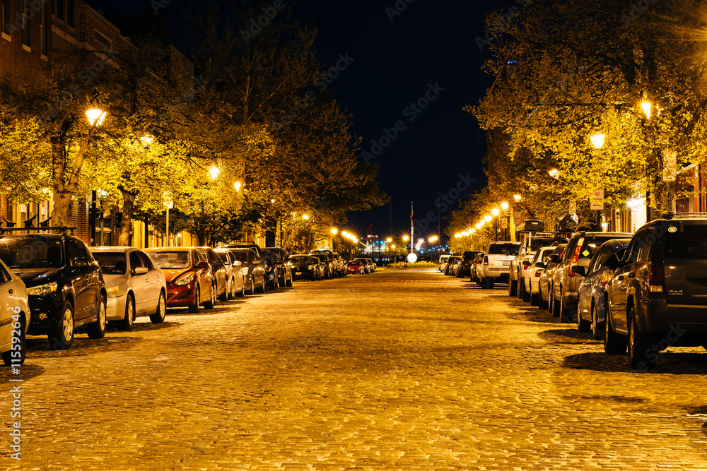 Cobblestone street at night, in Fells Point, Baltimore, Maryland