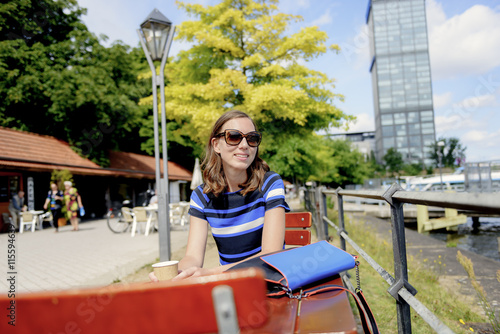 Germany, Berlin, Treptower Park, Woman at cafe table photo