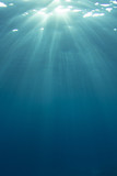 Underwater blue ocean background with sunlight in sea