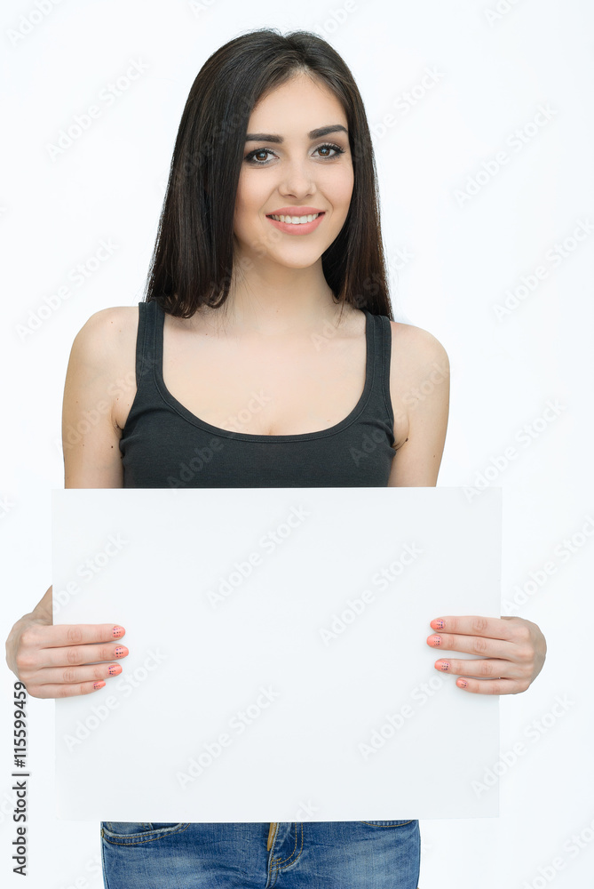 Young smiling woman show blank card or paper Young smiling woman show blank card or paper
