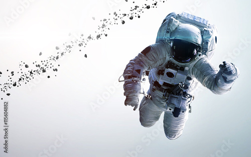 Fototapeta Naklejka Na Ścianę i Meble -  Astronaut in outer space. Spacewalk. Elements of this image furnished by NASA