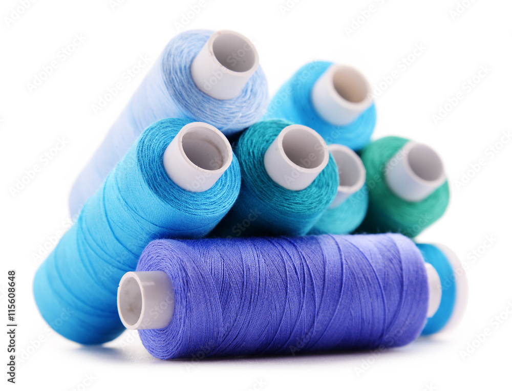 Composition with tailor threads isolated on white Composition with tailor threads isolated on white