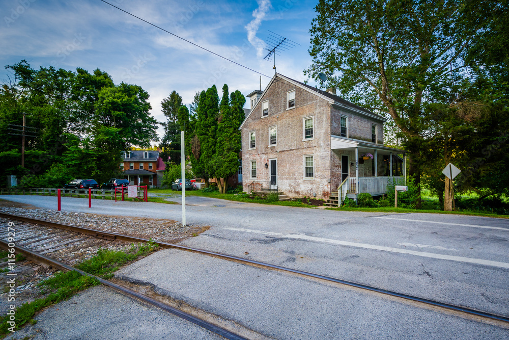 Railroad tracks and an old house  near Glen Rock, in rural York