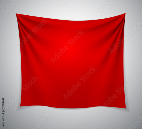 Red textile cloth banner with folds.