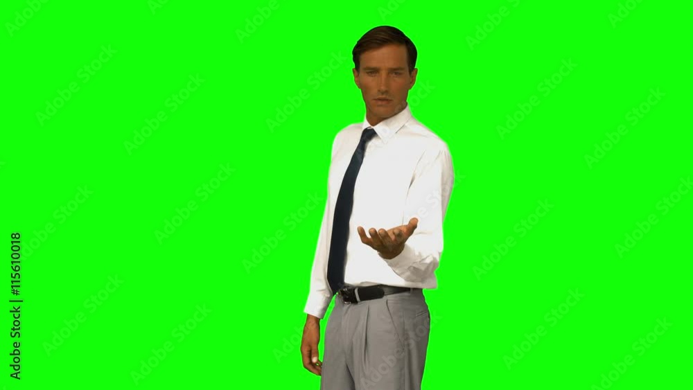 Businessman presenting with his hand Businessman presenting with his hand