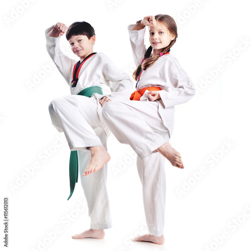 Two children athletes martial art taekwondo training