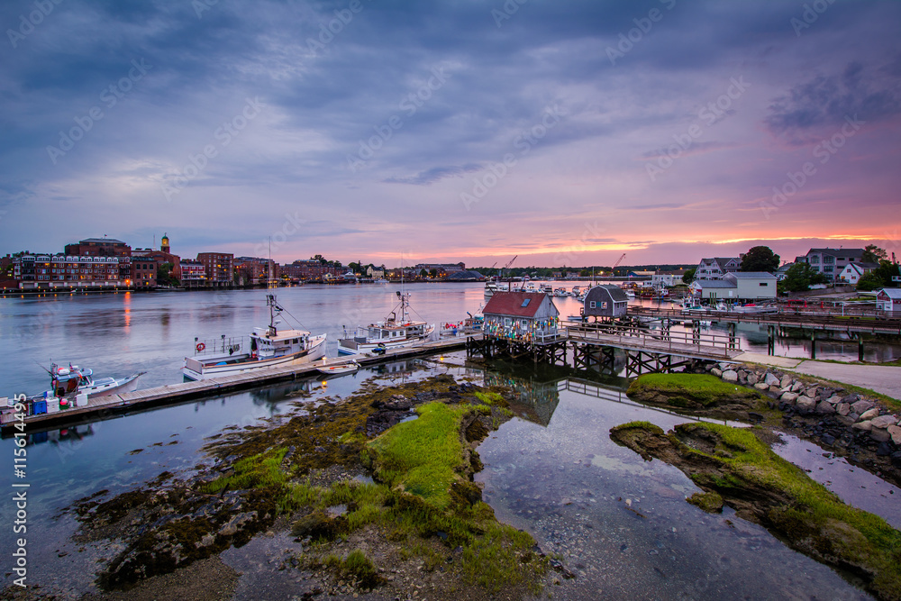 Sunset over piers in the Piscataqua River, in Portsmouth, New Ha