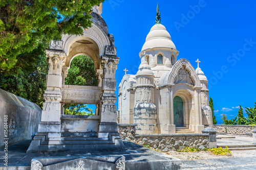 Local cemetery entrance Supetar. / Old cemetery in town Supetar, Island of Brac, view at entrance building exterior made with traditional architecture style. photo