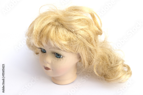 Blonde Girl Doll Head on White Background