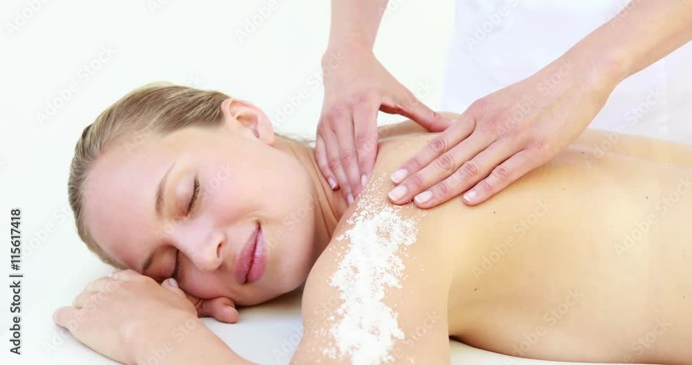 Woman enjoying a shoulder massage in high quality 4k format Woman enjoying a shoulder massage in high quality 4k format