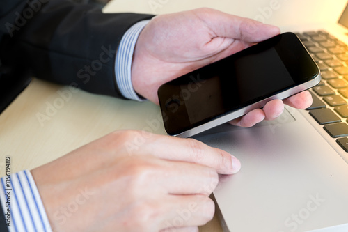 businessman hand on smat phone