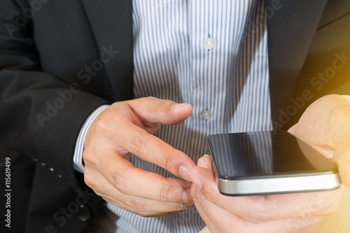 businessman hand on smat phone