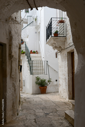 Narrow alley of Cisternino in Puglia