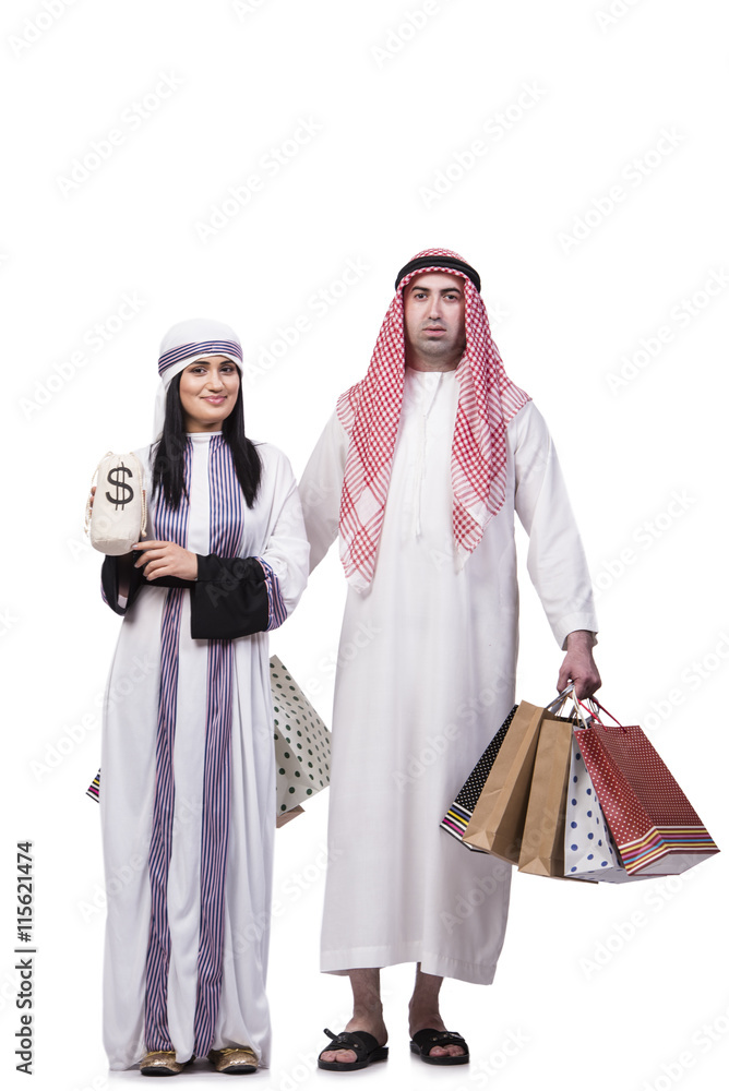 Happy arabic family after shopping isolated on white