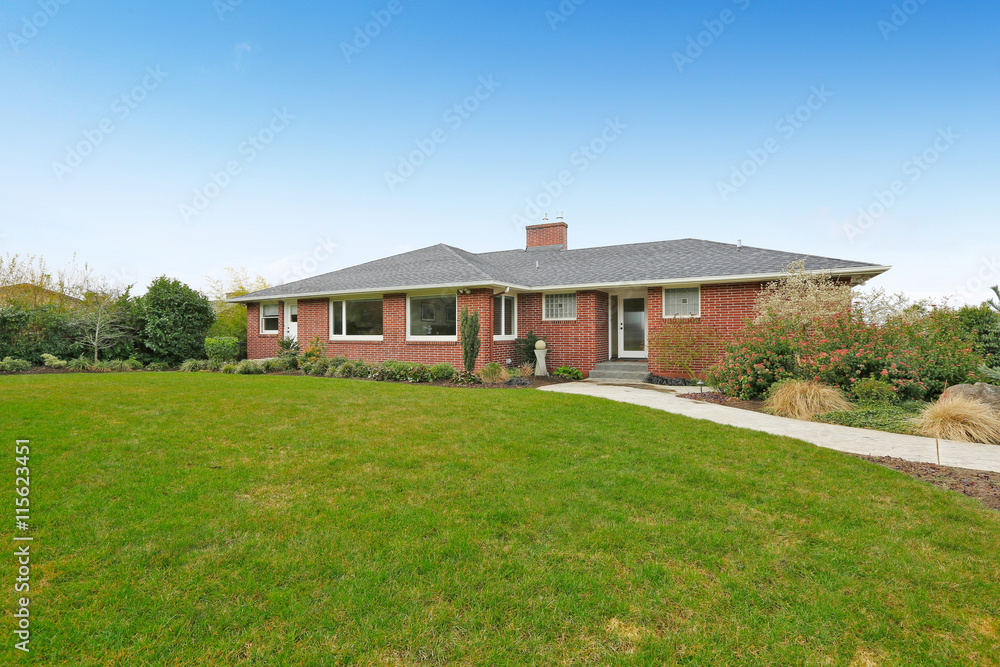Red brick house with tile roof. Front view Red brick house with tile roof. Front view