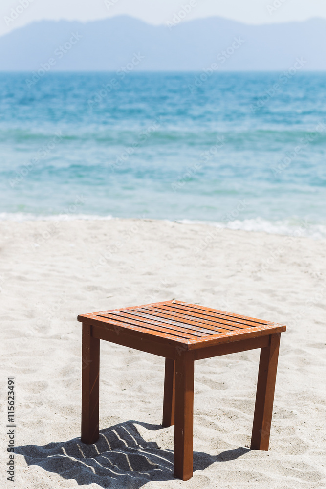 Beach furniture on white sand