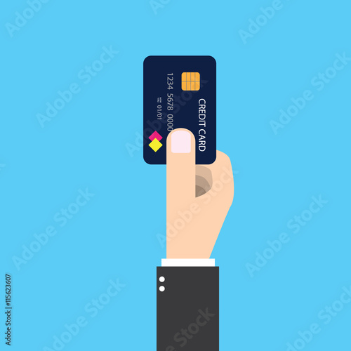 Businessman holding credit card in hand