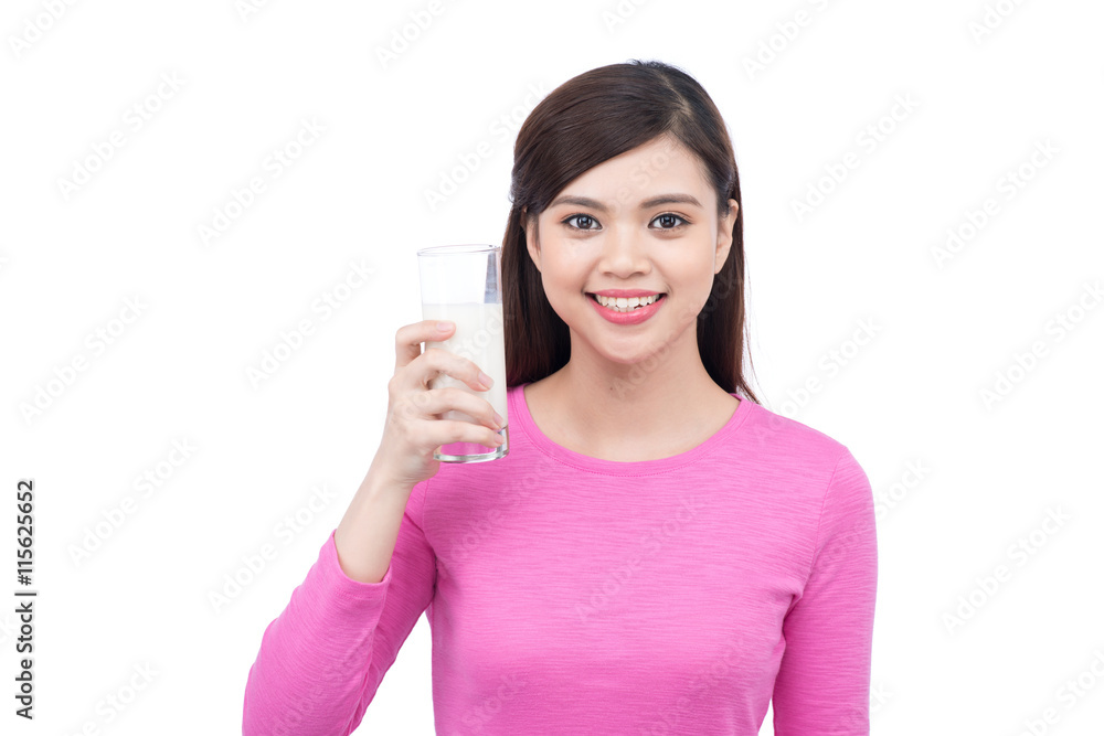 Portrait of pretty smiley asian young woman with glass of milk Portrait of pretty smiley asian young woman with glass of milk
