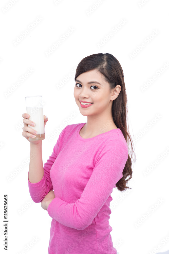 Portrait of pretty smiley asian young woman with glass of milk Portrait of pretty smiley asian young woman with glass of milk