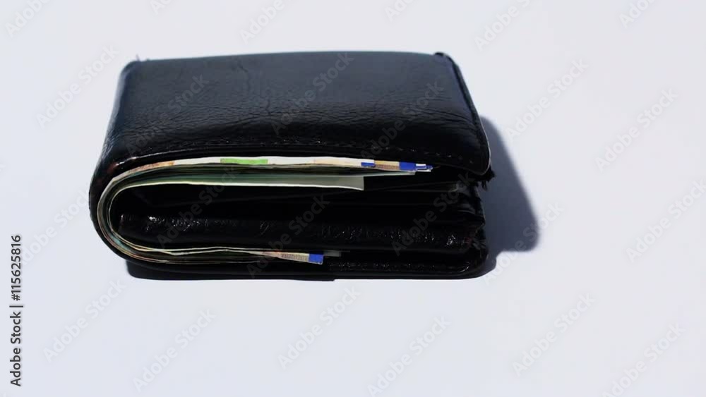 Rotating various of israeli shekel money bills in close black leather wallet. Rotating various of israeli shekel money bills in close black leather wallet.