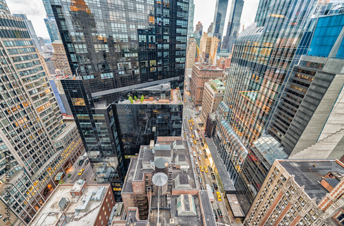 Streetward view of New York City. Manhattan skyline from rooftop