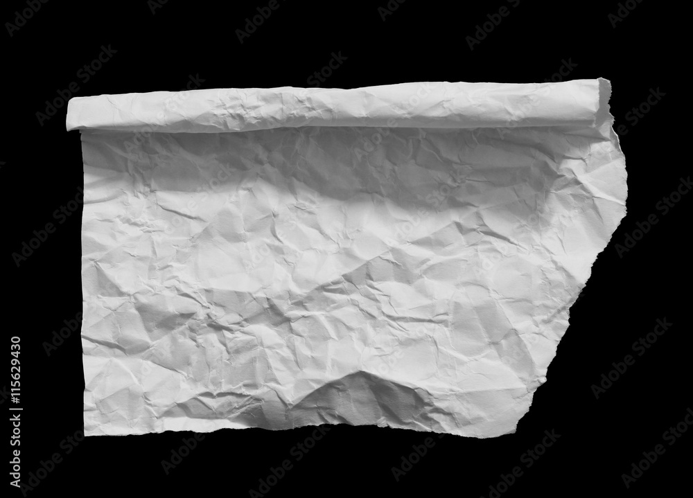 Piece of torn paper on black. Copy space Piece of torn paper on black. Copy space