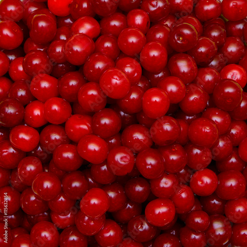 Set of beautiful red cherry in a glass dish
