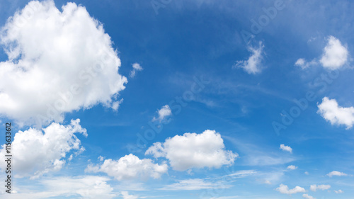 Vibrant color panoramic sky with cloud on a sunny day. © tanarch